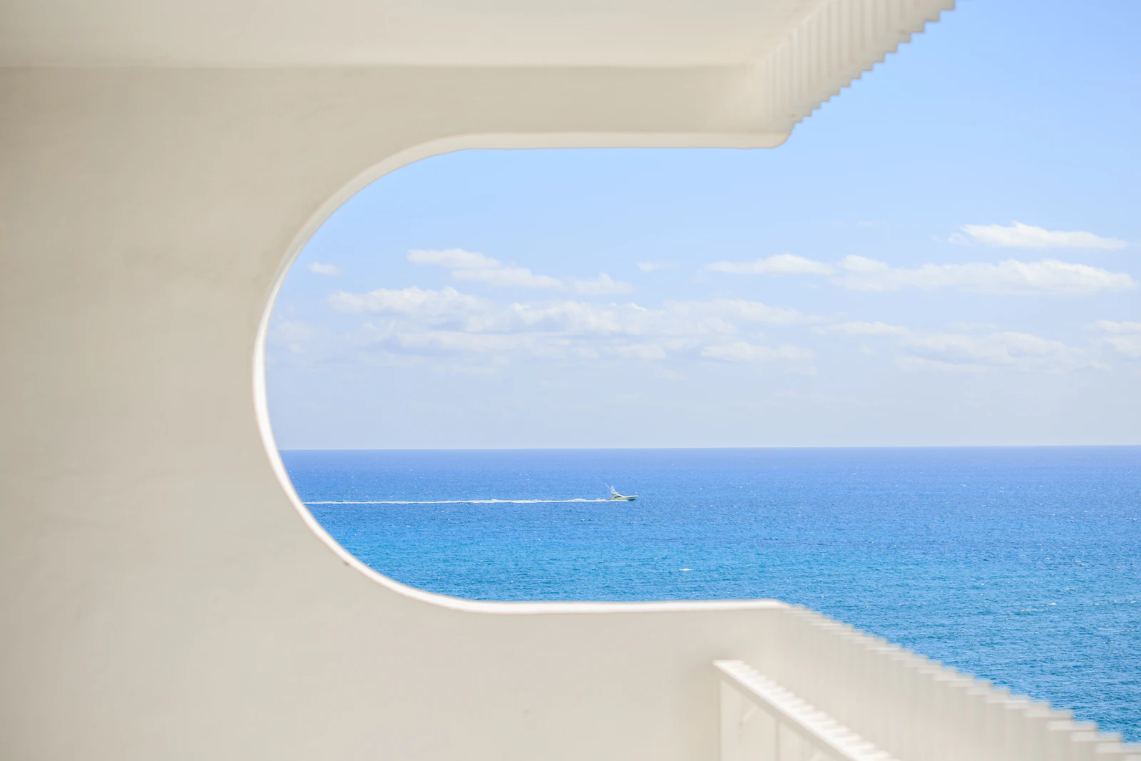 Ocean view from a sunny coastal home balcony